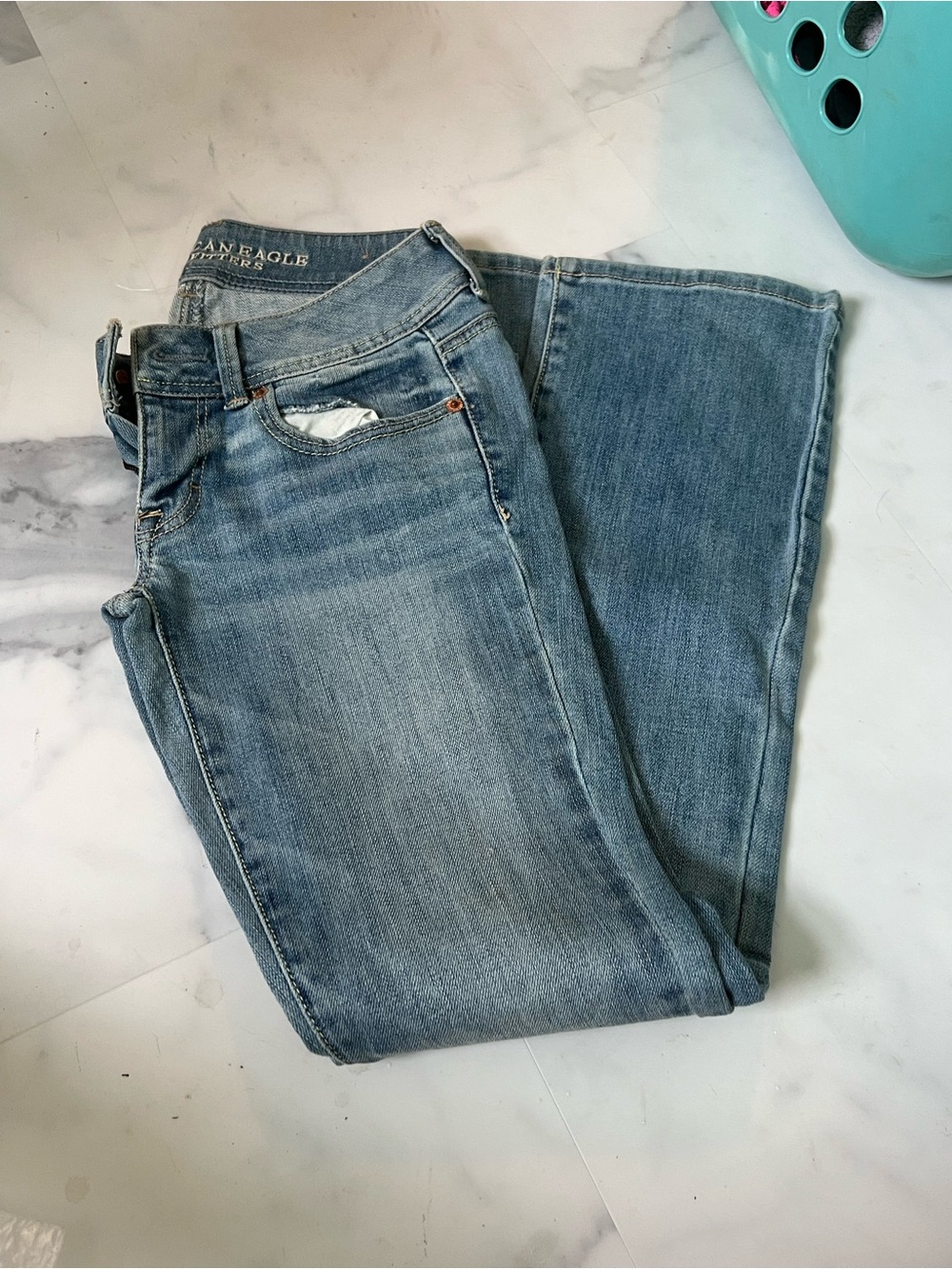 American Eagle Outfitters both 00 bootcut. You get both pairs